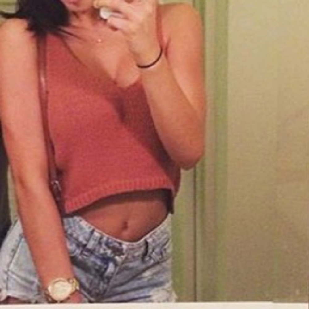 A pink, crop tank top